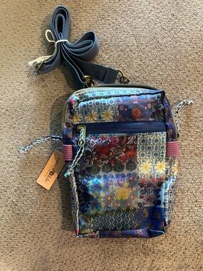 Natural Life Blue Patchwork 8-in-1 Pocket Crossbody Bag.